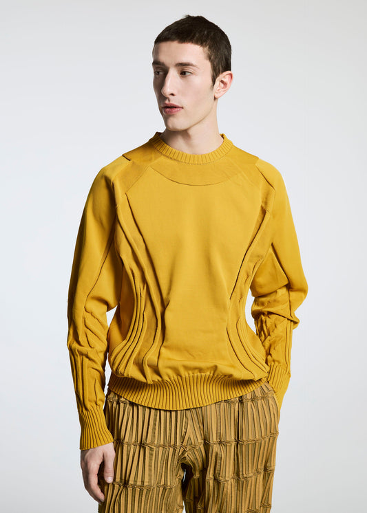 A model wears the A-Poc Able Issey Miyake TYPE O 015 trousers.
