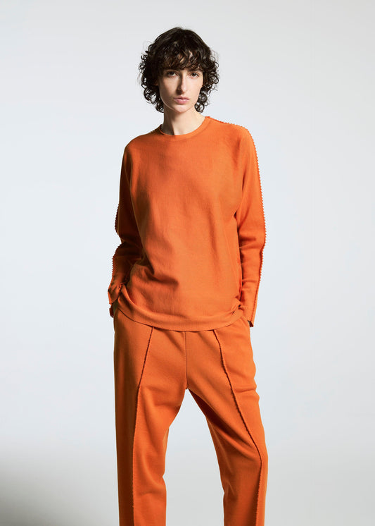 A model wears the APOCABLE TYPE A 001 3 prêt à porter.