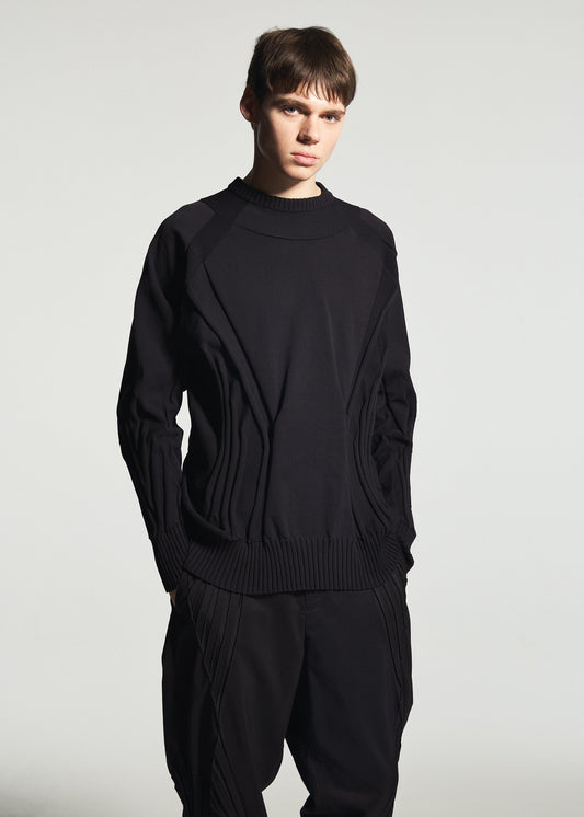 A model wears the A-POC ABLE ISSEY MIYAKE TYPE-K 001 top.