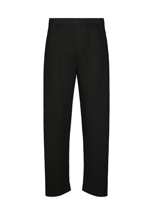 A product shot of the HOMME PLISSÉ ISSEY MIYAKE SLASH trousers in black.
