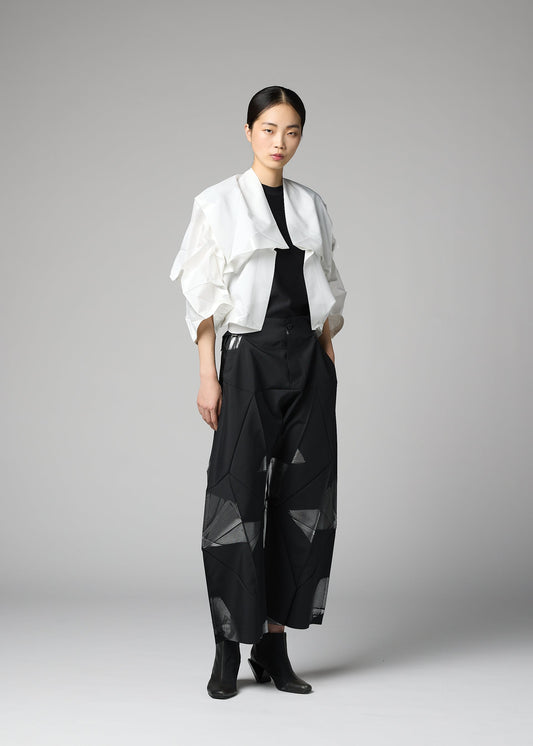 A model wears the 132 5. ISSEY MIYAKE No.1-2 cardigan.