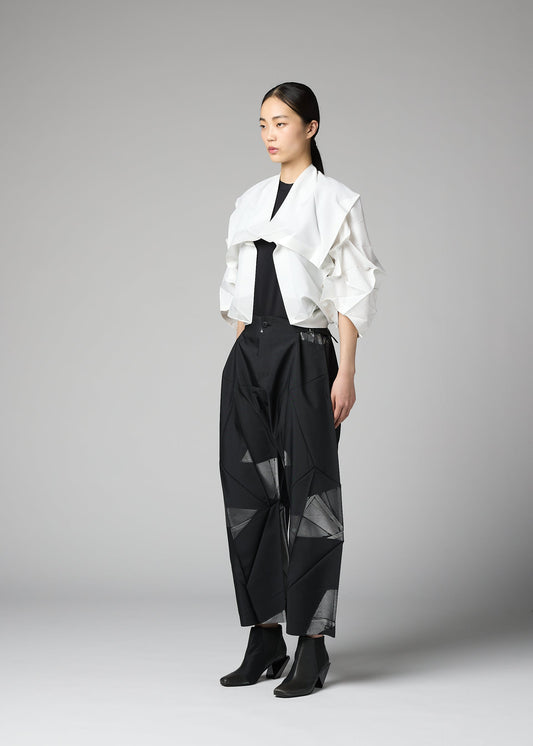 A model wears the 132 5. ISSEY MIYAKE No.1-2 cardigan.