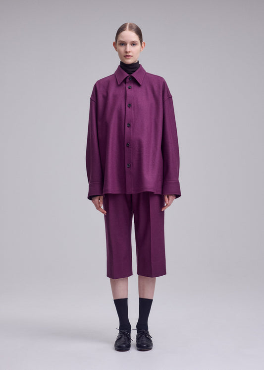 A model wears the ISSEY MIYAKE MANNER trousers.