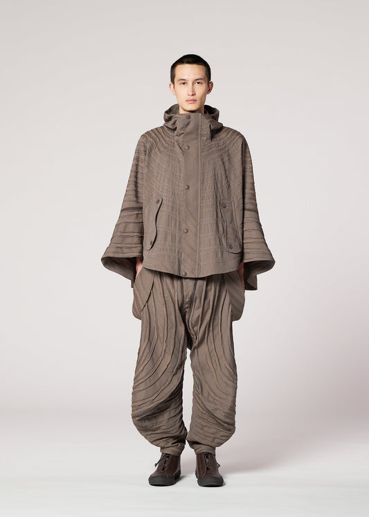 A model wears the IM MEN ENGRAVE prêt à porter.