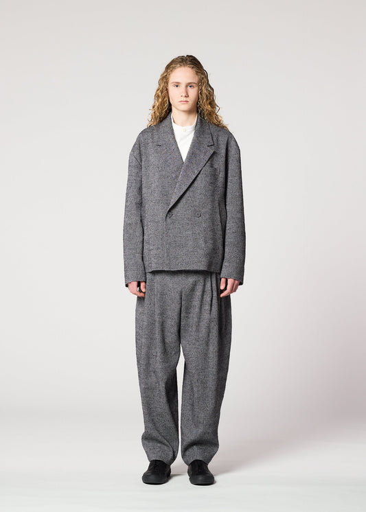A model wears the IM MEN TEXTURES prêt à porter.