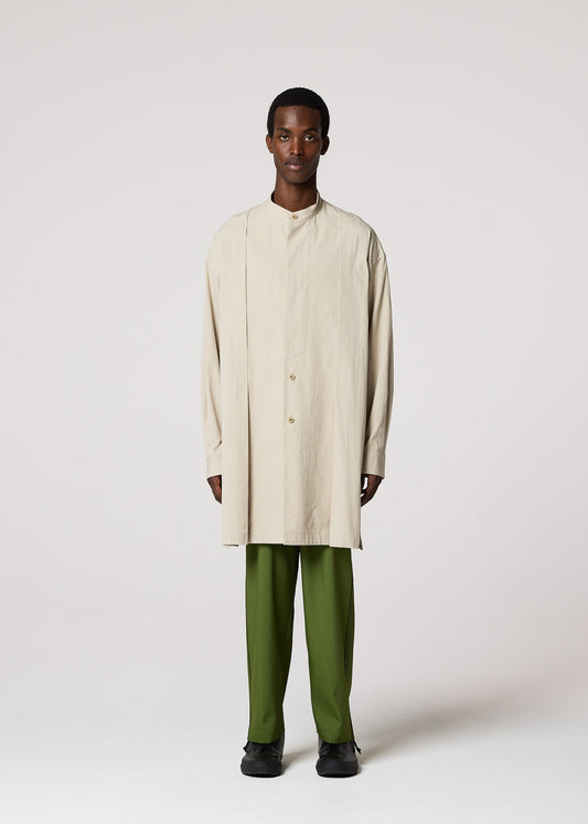 A model wears the IM MEN WHITE SHIRT prêt à porter.