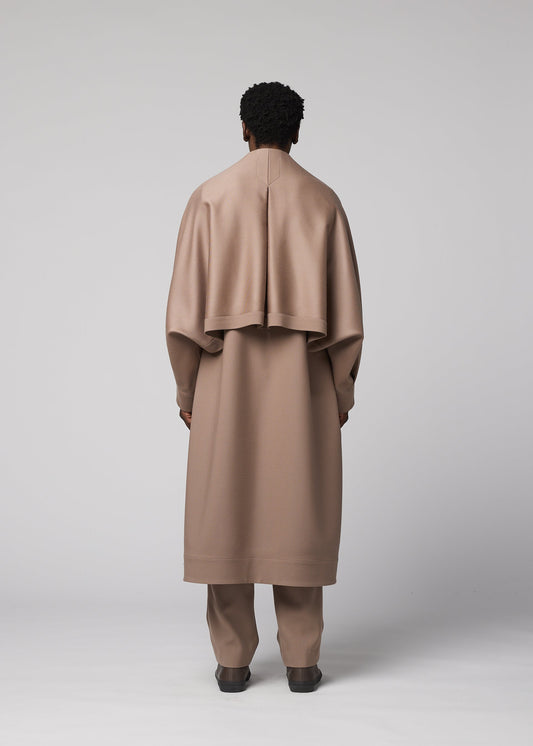 A model wears the IM MEN FRONT BACK coat.