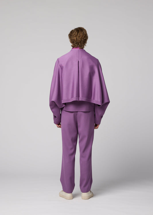 A model wears the IM MEN FRONT BACK jacket.