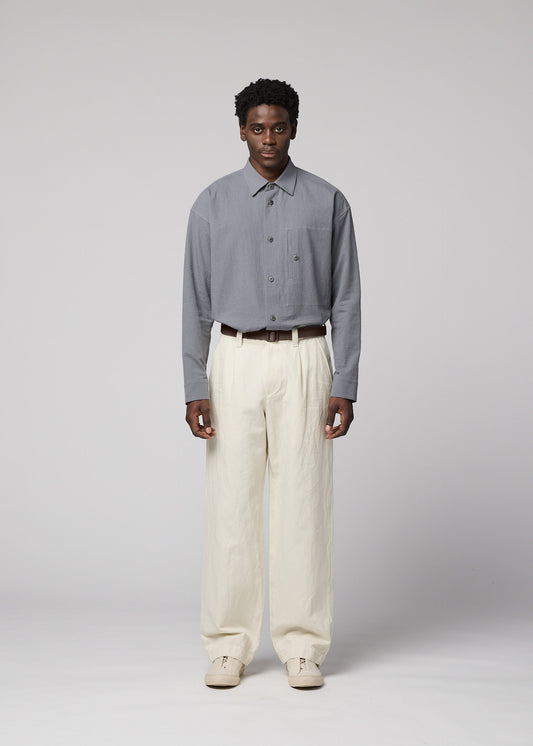 A model wears the IM MEN TOUGH WOOL COTTON trousers.
