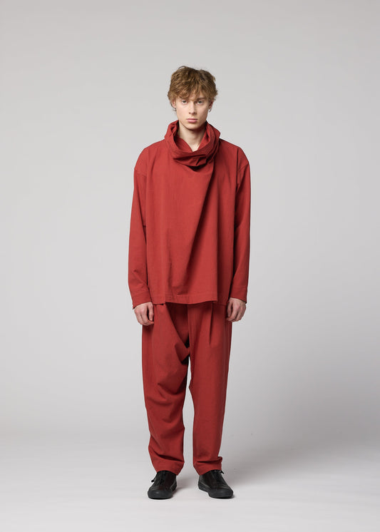 A model wears the IM MEN COTTON YAK trousers.