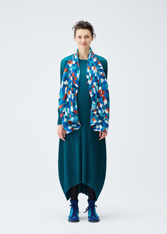 A model wears the PLEATS PLEASE ISSEY MIYAKE DANCING SQUARE vest.