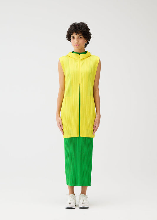 A model wears the Pleats Please Issey Miyake MONTHLY COLORS vest.