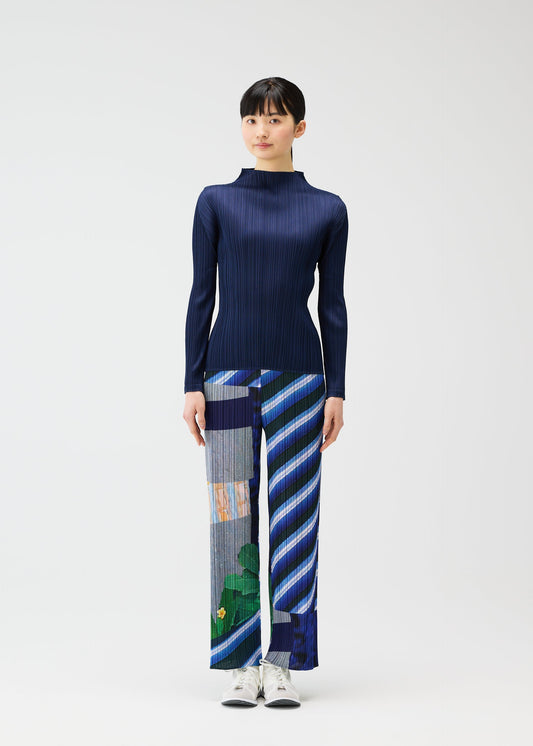 A model wears the PLEATS PLEASE ISSEY MIYAKE CITY COLLAGE prêt à porter.