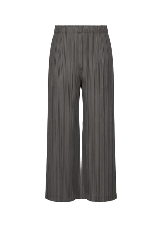 A product shot of the PLEATS PLEASE ISSEY MIYAKE THICKER BOTTOMS 2 trousers in charcoal.