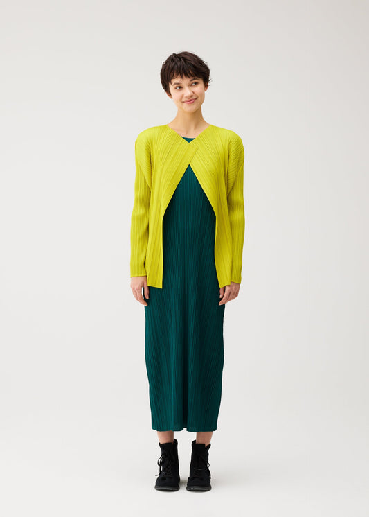 A model wears the PLEATS PLEASE ISSEY MIYAKE MONTHLY COLORS : OCTOBER monthly-colors-october-cardigan-blue-green.