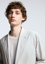 A model wears the A-POC ABLE ISSEY MIYAKE TYPE U 001 jacket.