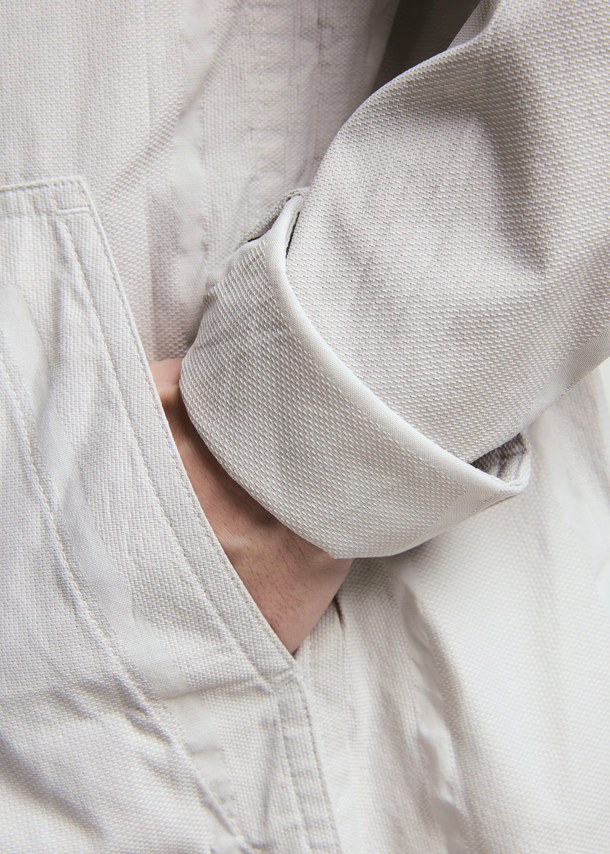 A model wears the A-POC ABLE ISSEY MIYAKE TYPE U 001 jacket.