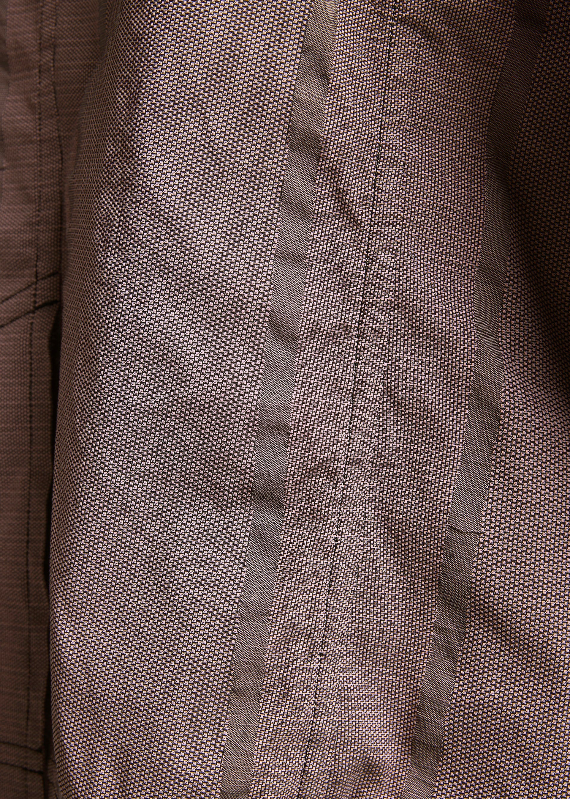 A model wears the A-POC ABLE ISSEY MIYAKE TYPE U 001 trousers.