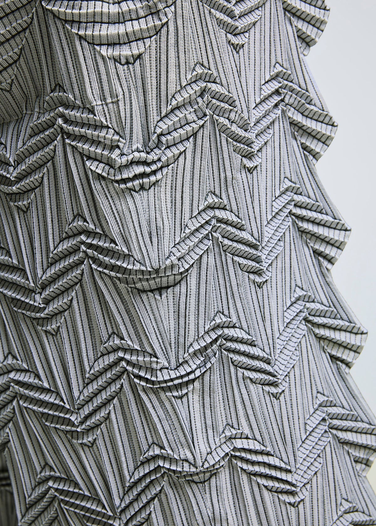 A model wears the A-POC ABLE ISSEY MIYAKE TYPE O 019 trousers.