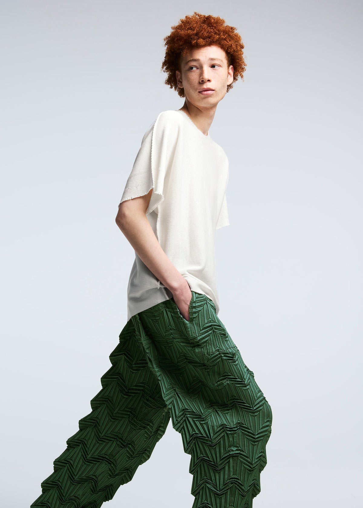 A model wears the A-POC ABLE ISSEY MIYAKE TYPE O 019 trousers.