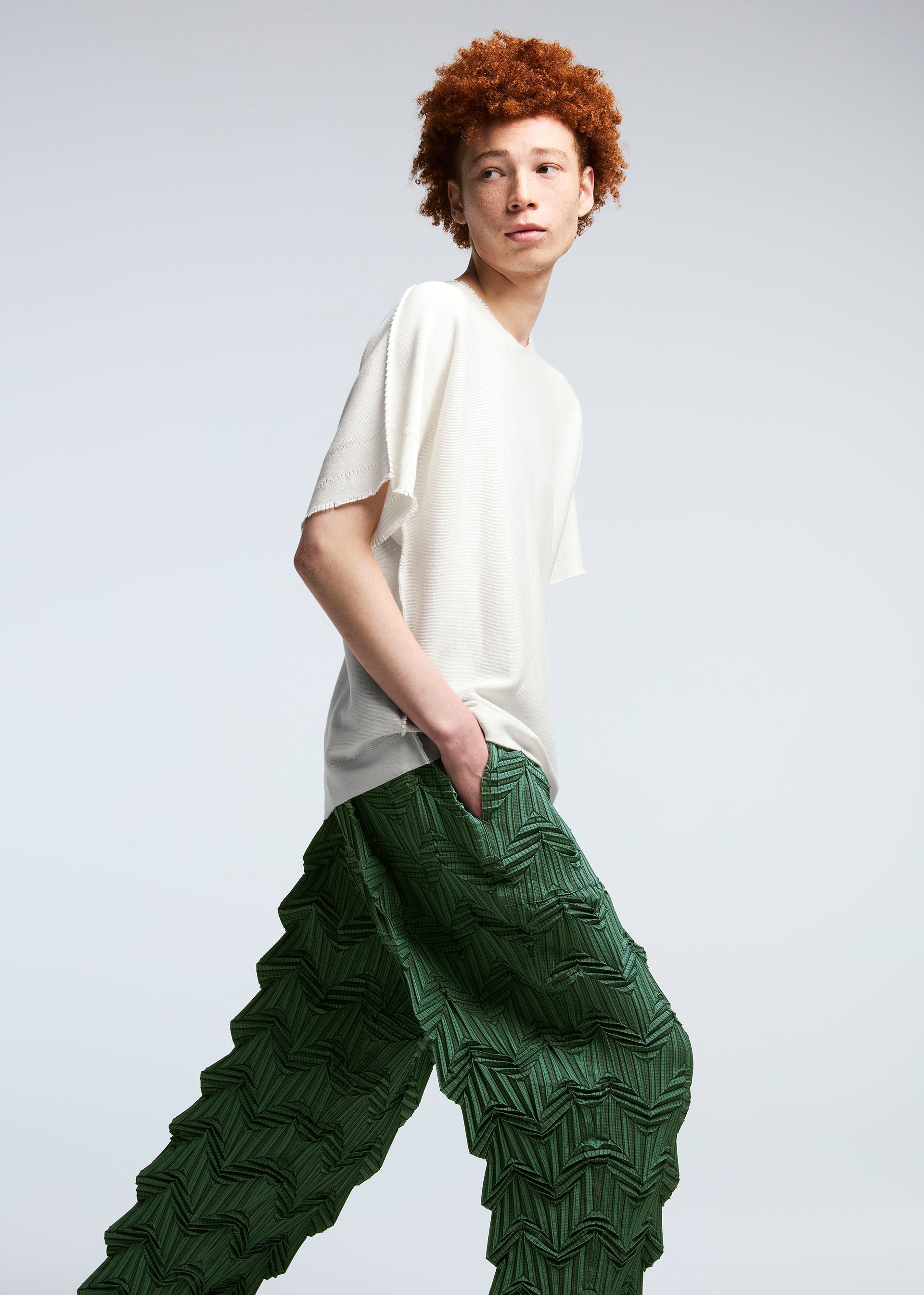 A model wears the A-POC ABLE ISSEY MIYAKE TYPE O 019 trousers.