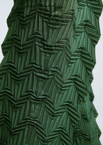 A model wears the A-POC ABLE ISSEY MIYAKE TYPE O 019 trousers.