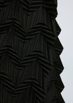 A model wears the A-POC ABLE ISSEY MIYAKE TYPE O 019 trousers.