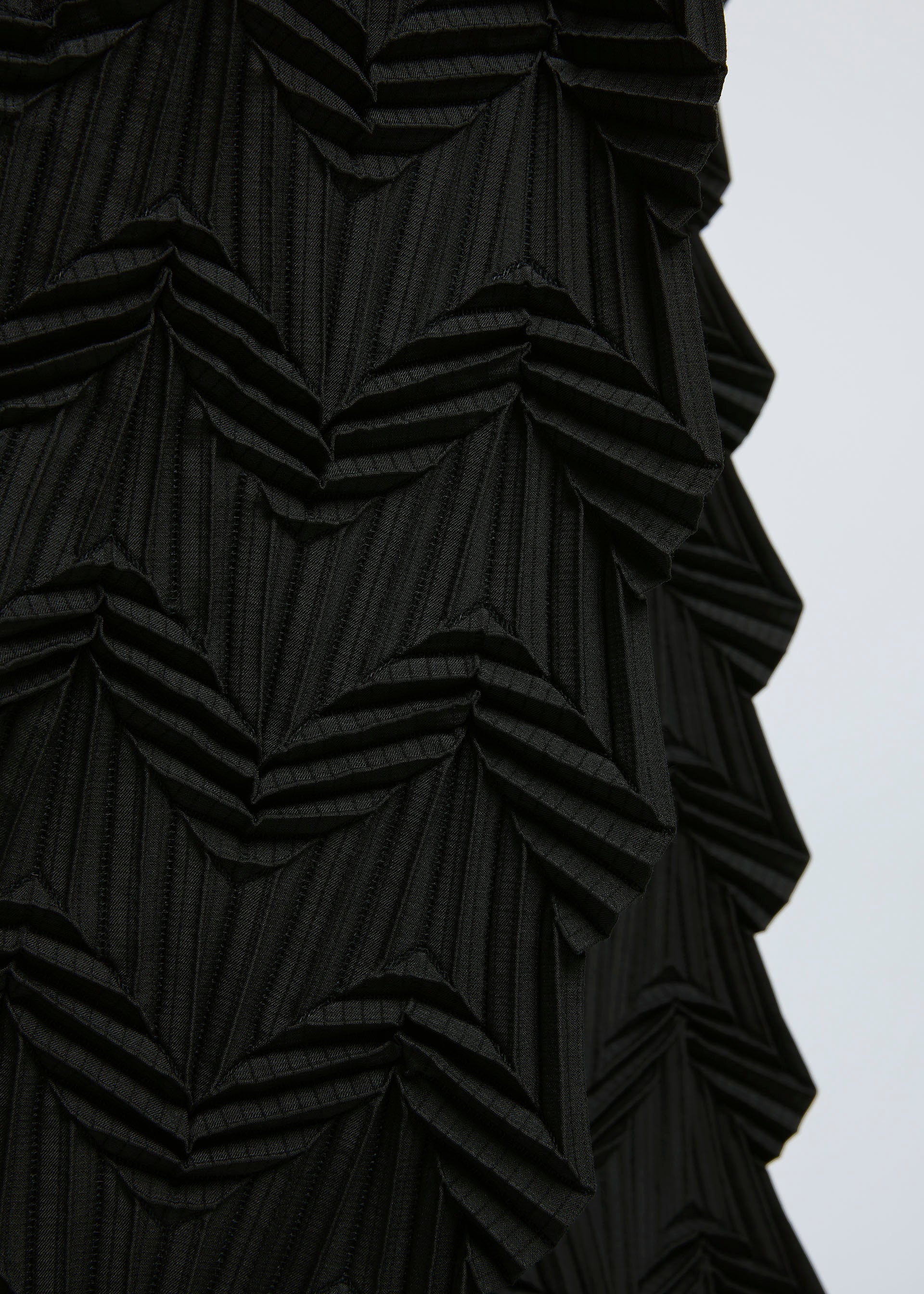 A model wears the A-POC ABLE ISSEY MIYAKE TYPE O 019 trousers.