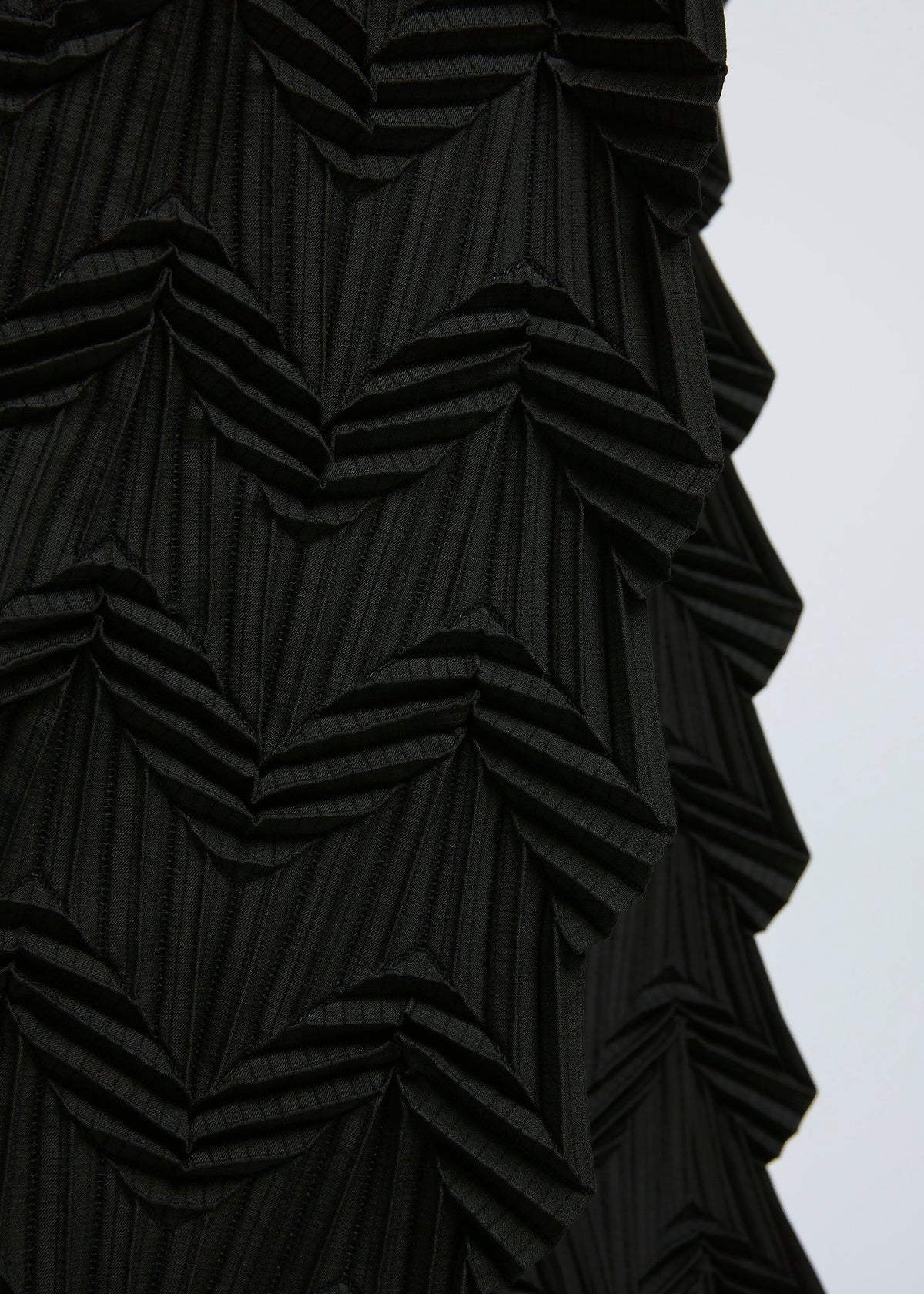 A model wears the A-POC ABLE ISSEY MIYAKE TYPE O 019 trousers.