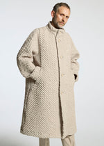 A model wears the A-Poc Able Issey Miyake TYPE O 011 coat.