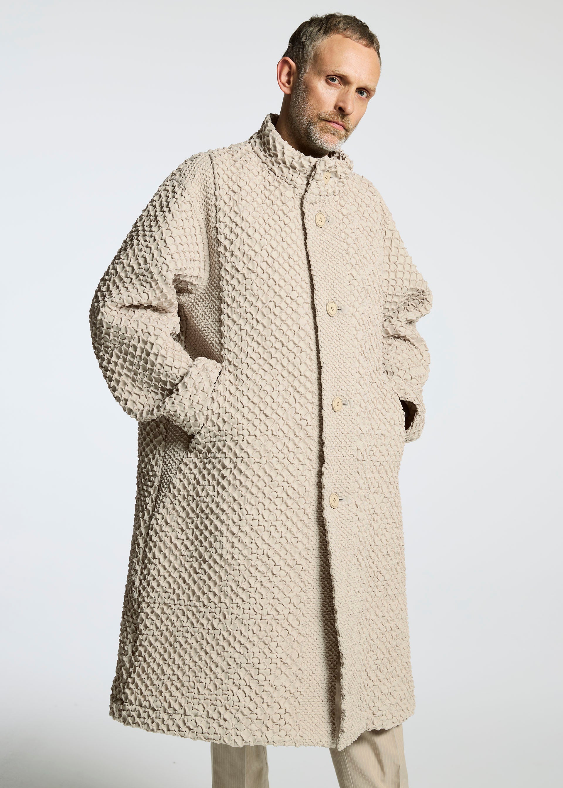 A model wears the A-Poc Able Issey Miyake TYPE O 011 coat.