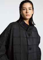 A model wears the APOCABLE TYPE O 002 prêt à porter.