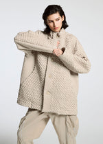 A model wears the A-Poc Able Issey Miyake TYPE O 011 blouson.