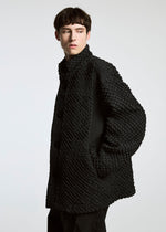 A model wears the A-Poc Able Issey Miyake TYPE O 011 blouson.