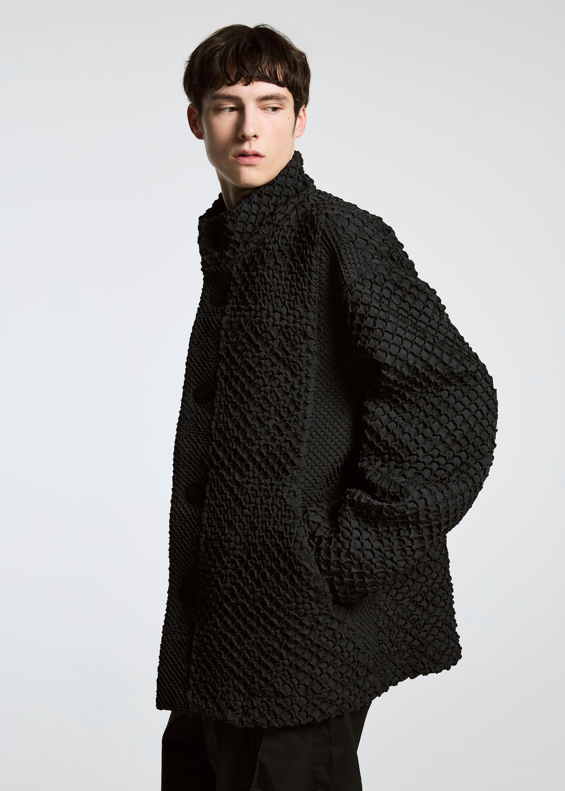 A model wears the A-Poc Able Issey Miyake TYPE O 011 blouson.