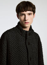 A model wears the A-Poc Able Issey Miyake TYPE O 011 blouson.