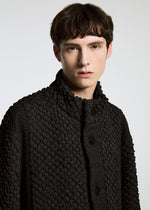 A model wears the A-Poc Able Issey Miyake TYPE O 011 blouson.