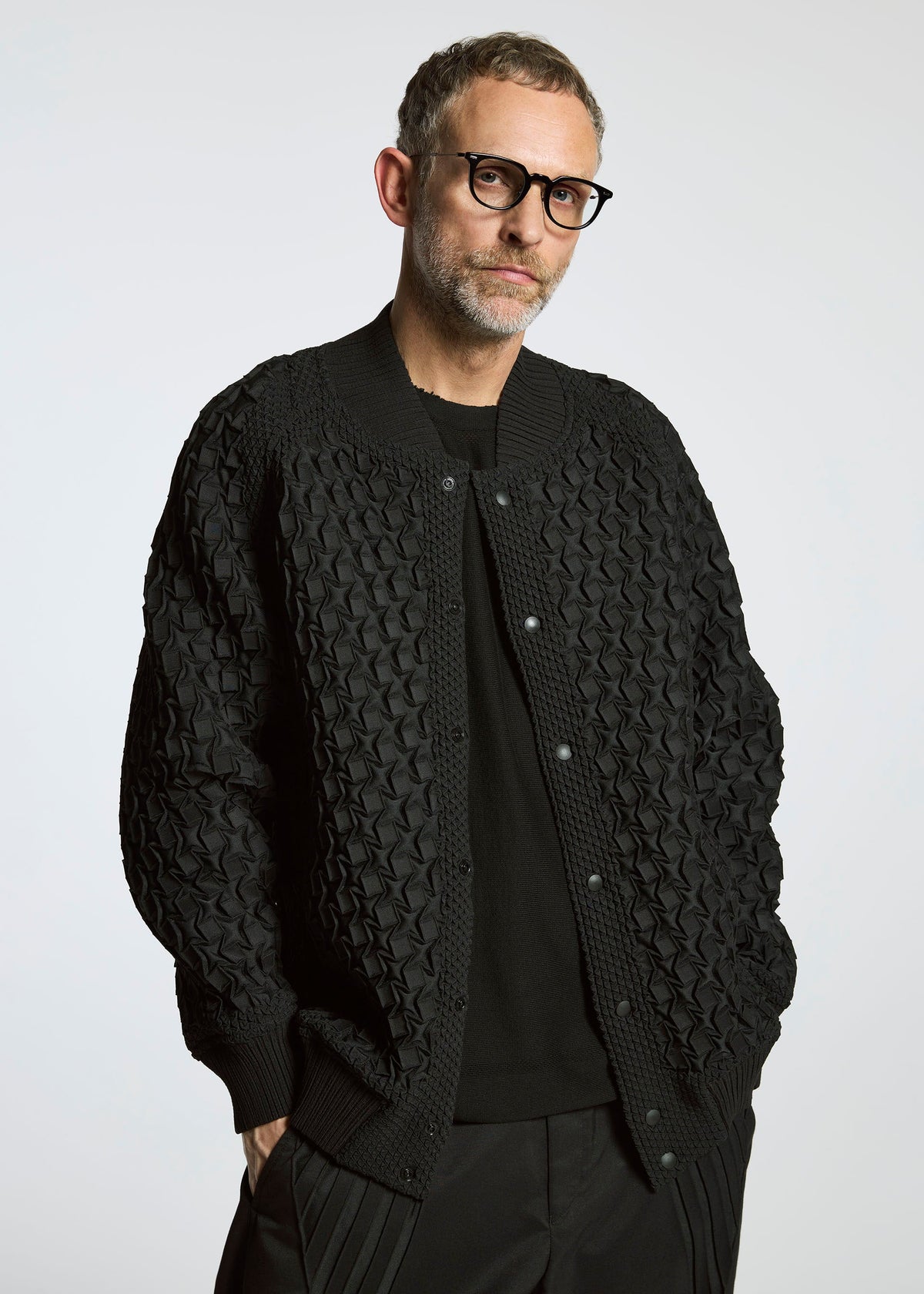 A model wears the A-POC ABLE ISSEY MIYAKE TYPE O 001 jacket.