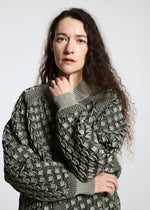 A model wears the A-POC ABLE ISSEY MIYAKE TYPE O 001 jacket.