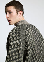 A model wears the A-POC ABLE ISSEY MIYAKE TYPE O 001 jacket.