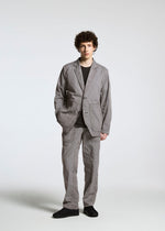 A model wears the APOCABLE TYPE U 001 prêt à porter.