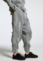 A model wears the APOCABLE TYPE O 010 prêt à porter.