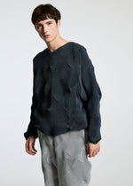 A model wears the APOCABLE TYPE O 010 prêt à porter.