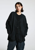 A model wears the APOCABLE TYPE O 010 prêt à porter.