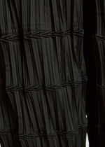 A model wears the A-Poc Able Issey Miyake TYPE O 015 trousers.