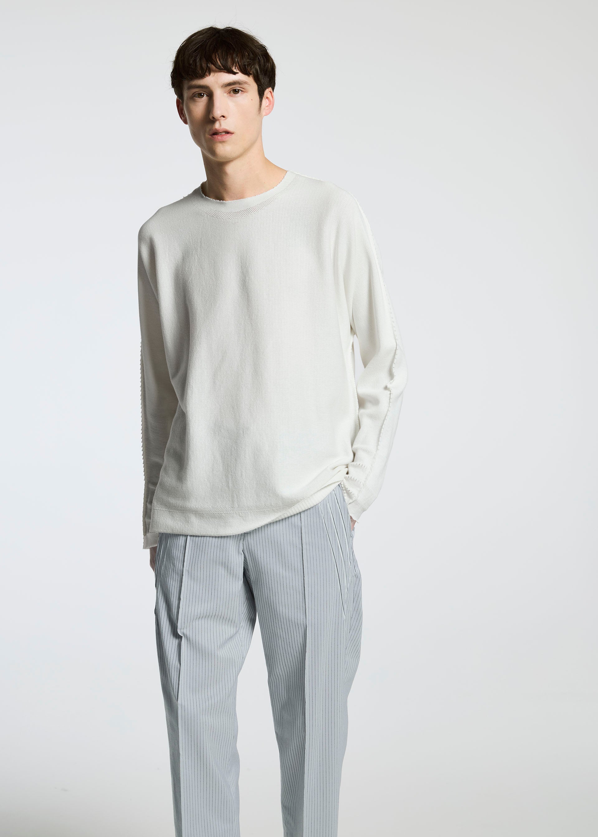 A model wears the A-Poc Able Issey Miyake TYPE S 001 3 trousers.
