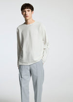 A model wears the A-Poc Able Issey Miyake TYPE S 001 3 trousers.