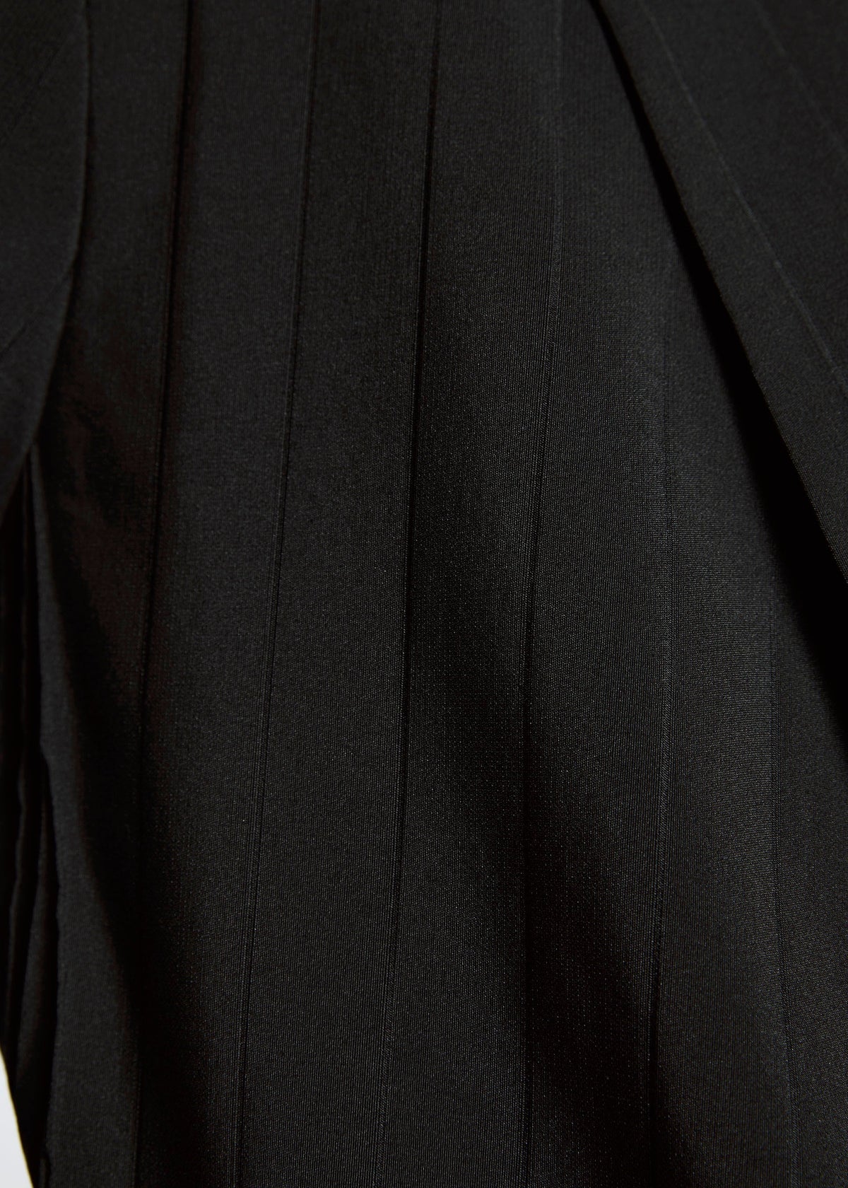 A model wears the A-Poc Able Issey Miyake TYPE ? 007 trousers.