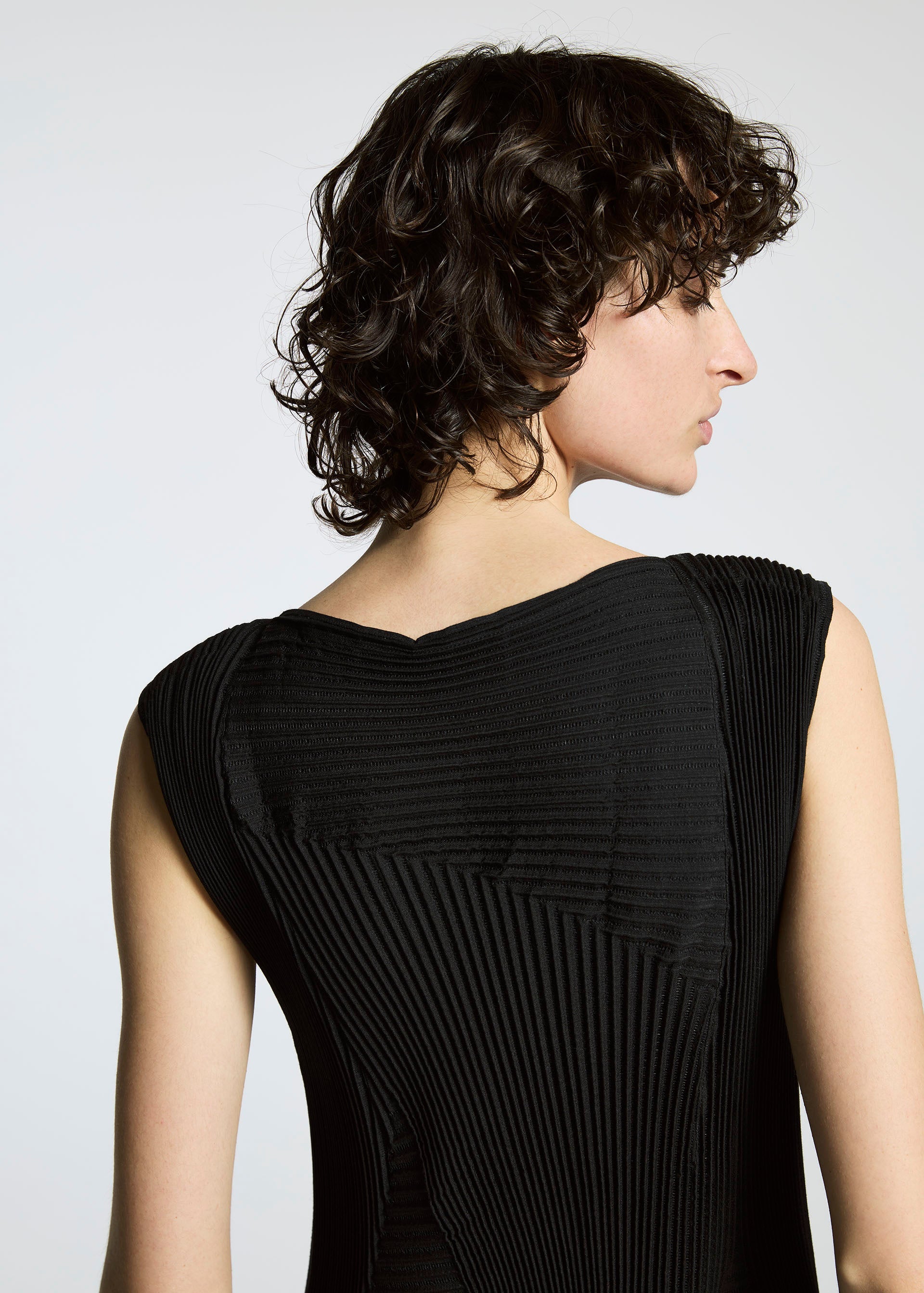 A model wears the A-Poc Able Issey Miyake TYPE ? 008 dress.