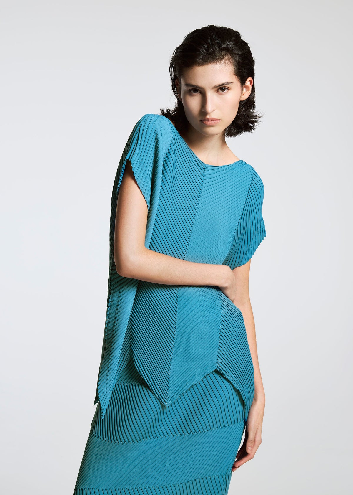 A model wears the A-Poc Able Issey Miyake TYPE P 004 shirt.